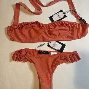NAANAA coral frill bikini. Brand new with tags. SIZE 14.